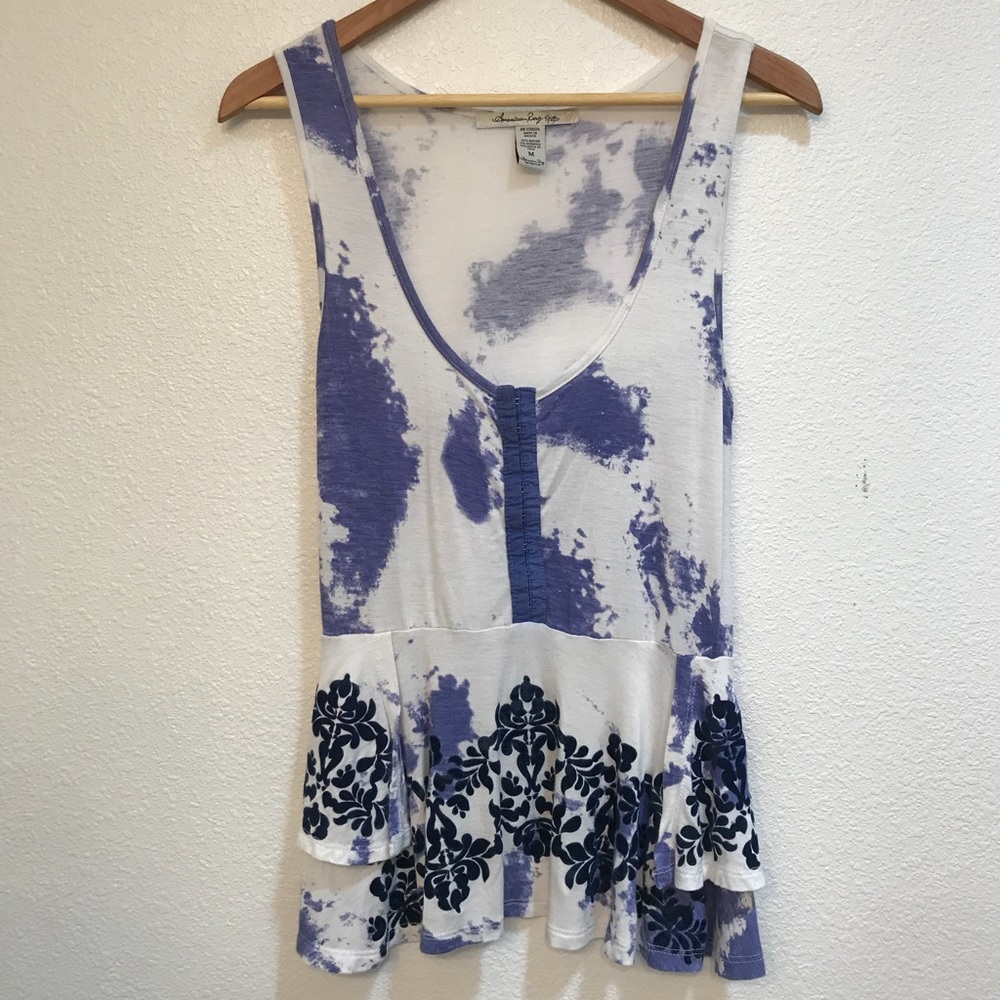 Blue and white peplum top with velvet detailing